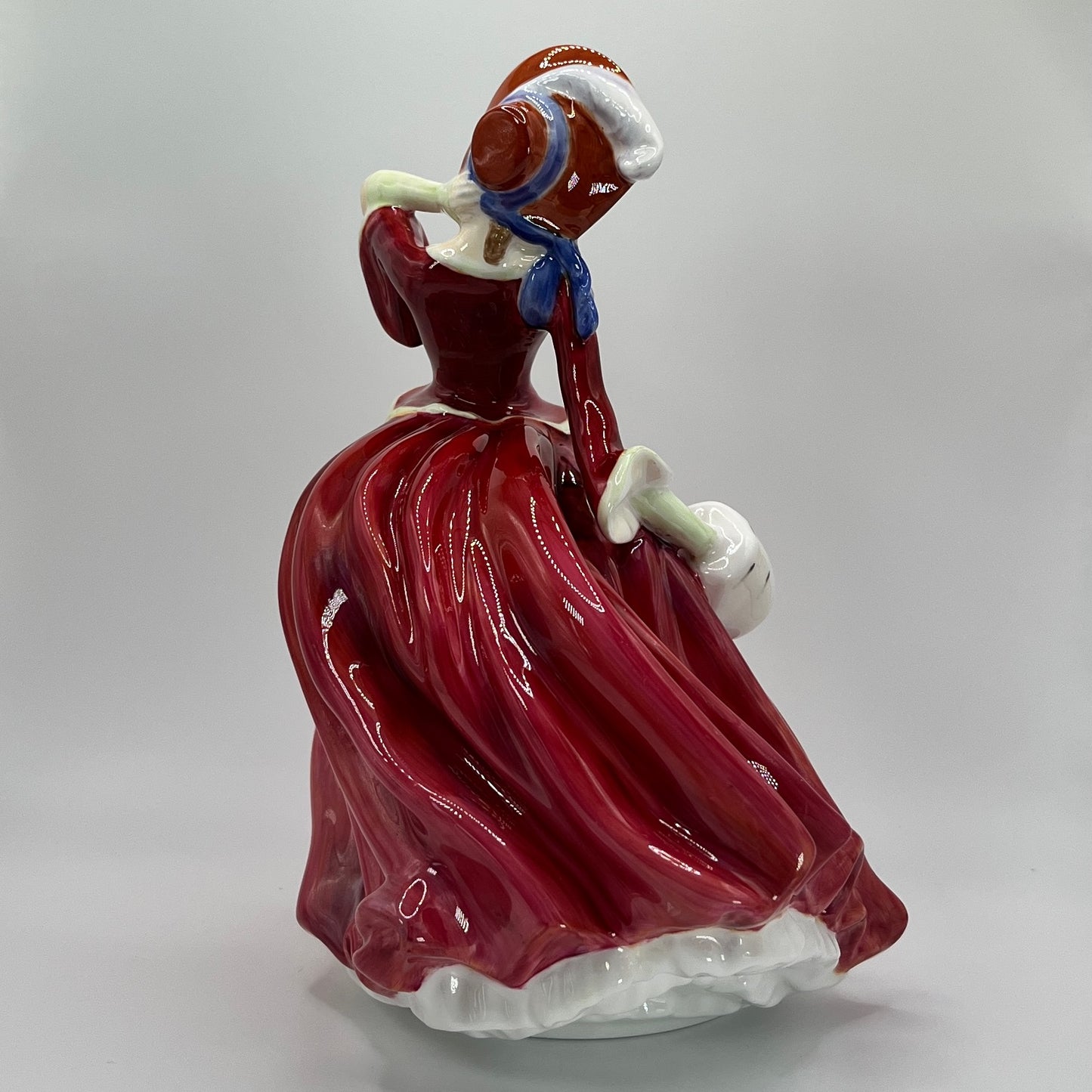 Royal Doulton Figurine "Autumn Breezes" HN 1934 (1939 Edition) – Hand-Painted Porcelain Collectible