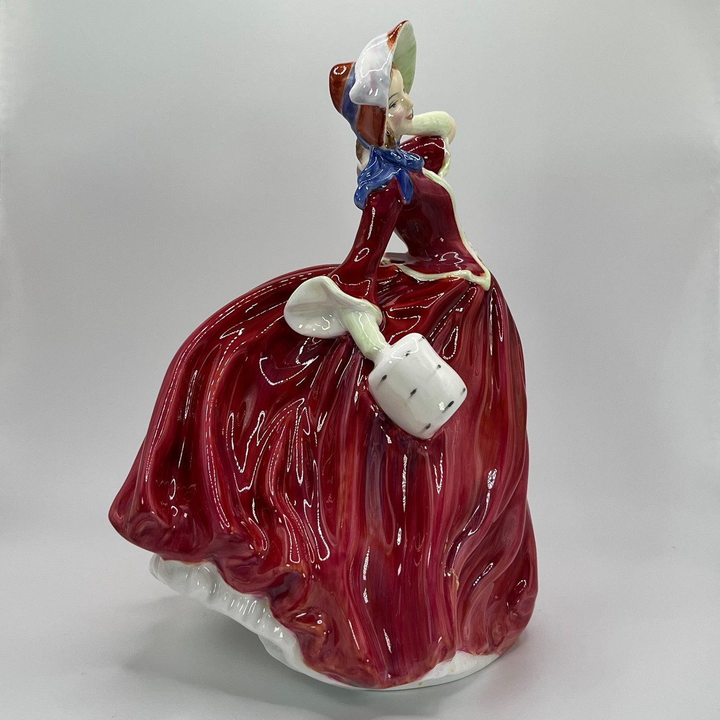 Royal Doulton Figurine "Autumn Breezes" HN 1934 (1939 Edition) – Hand-Painted Porcelain Collectible