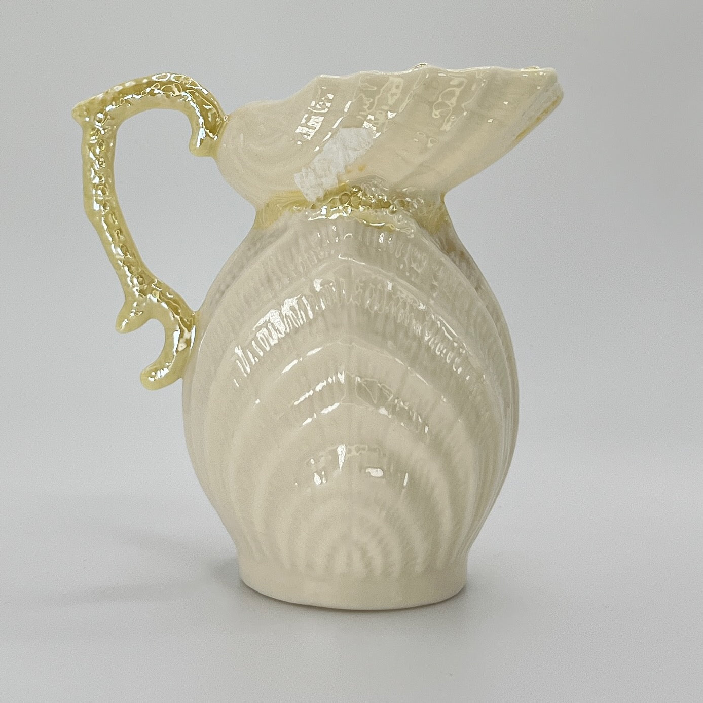 Belleek Shell Ewer Pitcher – Irish Parian Porcelain with Yellow Handle (6th Mark, 1965–1980)