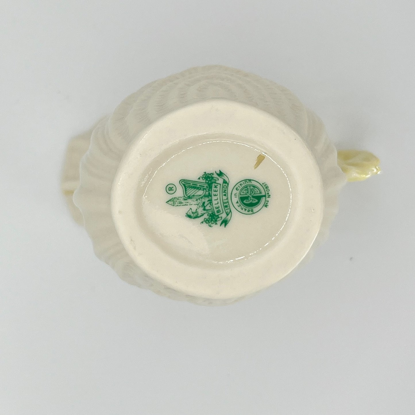 Belleek Shell Ewer Pitcher – Irish Parian Porcelain with Yellow Handle (6th Mark, 1965–1980)