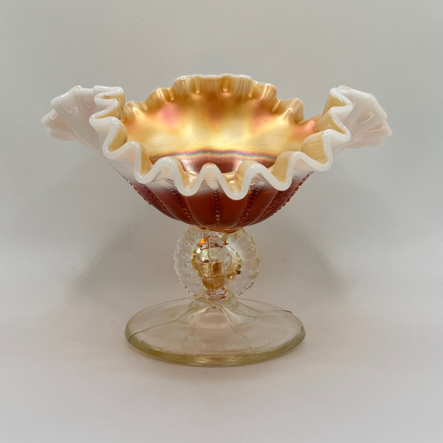 Antique Dugan Beaded Shell Marigold Opalescent Glass Compote with Ruffled Edge and Scroll Stem