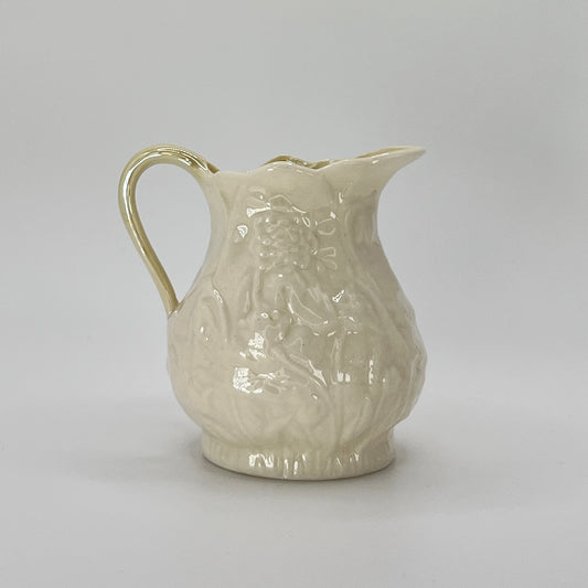 Belleek Cream Pitcher – Irish Parian Porcelain with Embossed Florals & Yellow Handle (6th Mark, 1965–1980)