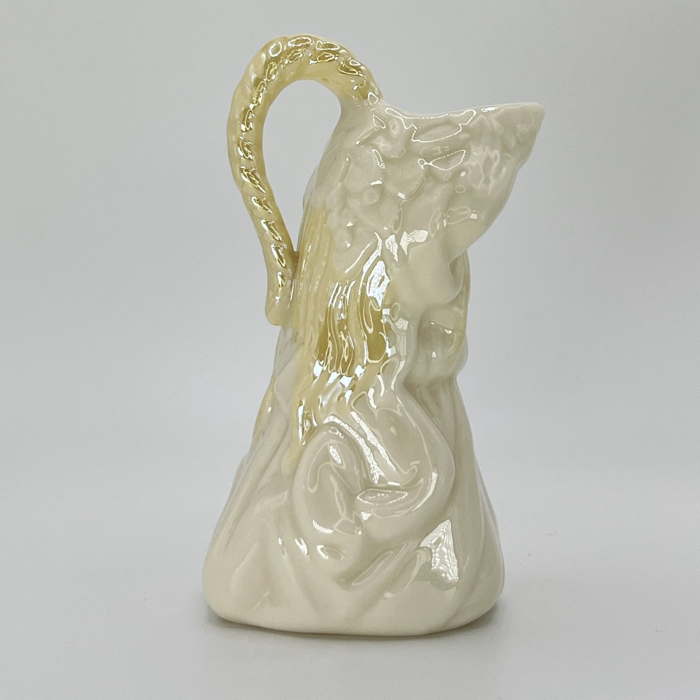 Belleek Draped Woman Ewer – Irish Parian Porcelain with Yellow Glazed Handle (6th Mark, 1965–1980)