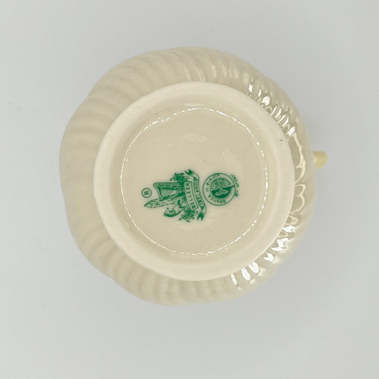 Belleek Cream Pitcher with Embossed Bow & Gold Handle – Ireland, 6th Mark (1965–1980)
